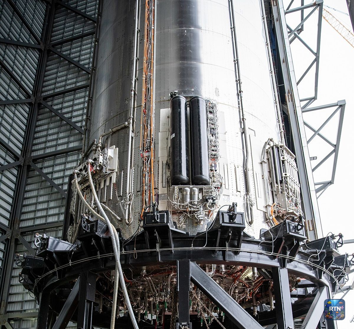 The base of a Super Heavy booster inside a SpaceX hangar (NASA file photo)